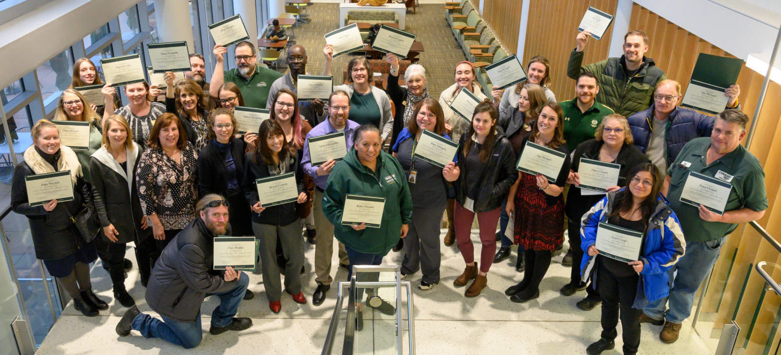 31 CSU employees who completed the supervisor development training posing with certificates at the Lory Student Center